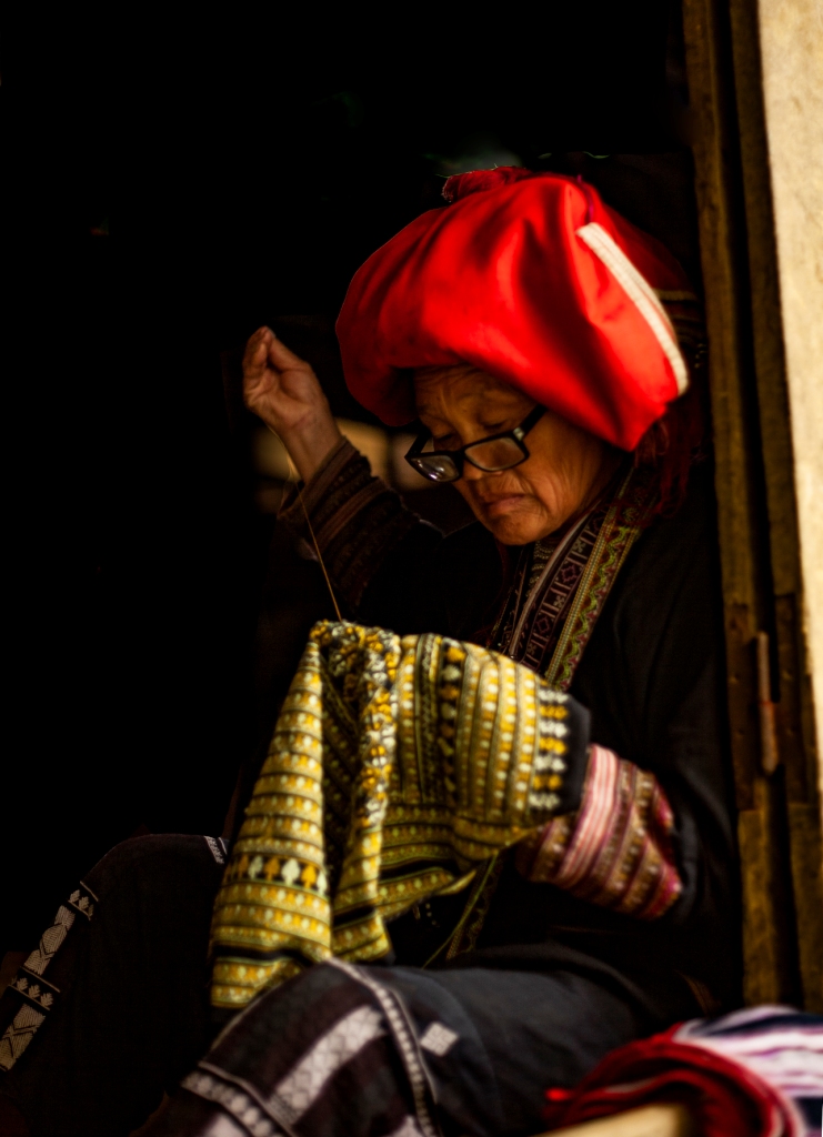Senior Lady working on handicraft item